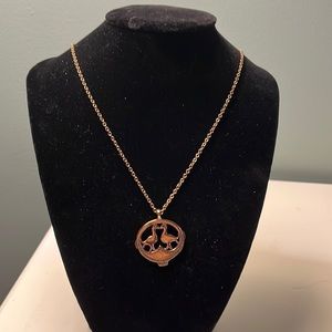 N47. Gold necklace with birds.